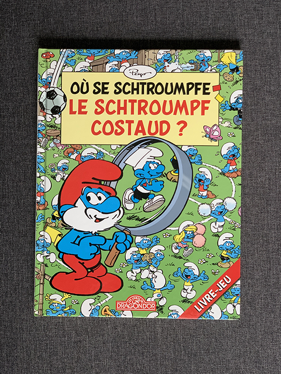 Les Schtroumpfs - Où se schtroumpfe le schtroumpf Costaud